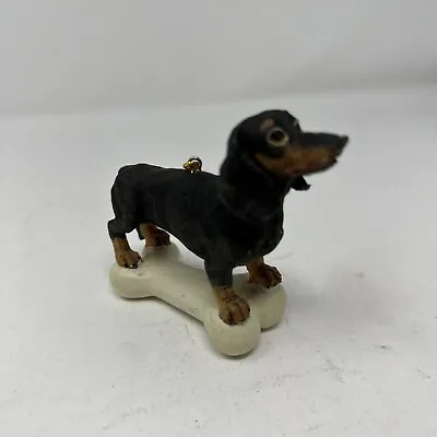 Dachshund Dog Standing On A Bone Christmas Ornament • $9.99