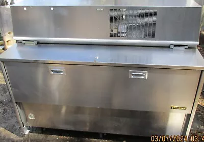 Preowned Traulsen RMC58D6 58  Double Side School Milk Cooler With SIX 6  Casters • $895