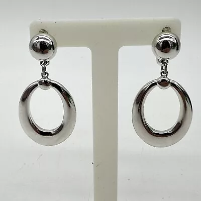 Vintage Monet Silver Tone Dangle Hoop Style Oval Clip On Earrings • $25