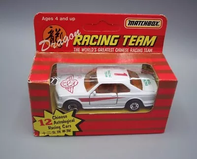 “MATCHBOX  **CHINESE DRAGON RACING TEAM** MERCEDES 500SEC  AMG W/ PIG DECO MIB • $12