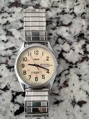 Vintage Lorus Men’s Wrist Watch Steel Yellow Dial Date Lumibrite Water Resistant • $15