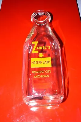 1930s QUART ZOBELS MODERN DAIRY MILK BOTTLE CLEAR AND ORANGE TRAVERSE CITY MICH. • $35.99