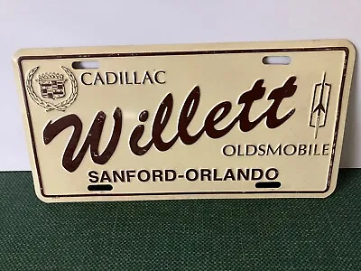 Vintage Sanford - Orlando Willett Cadillac Oldsmobile Booster License Plate • $39