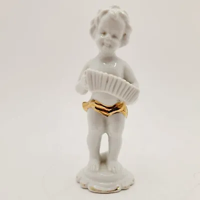 Vintage Porcelain Boy Cupid Playing Accordian Figurine Gold Accent Japan 5.75  • $15