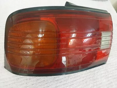 JDM Mazda Familia 323 Protegé Sedan BG Tail Light Rear Back Lamp OEM 220-61600L • $149.99