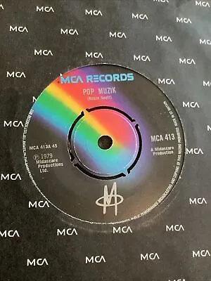 M - Pop Muzik.     Used 7” Single Record • £3.25