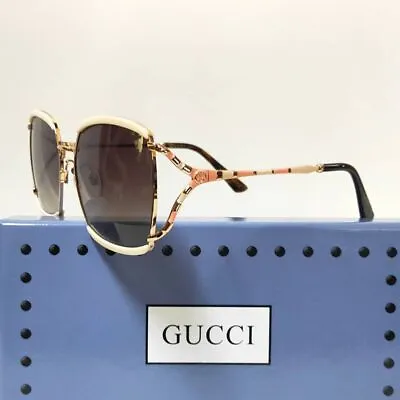 $189 • Buy GUCCI GG0593SK 002 Gold/Ivory Frame Brown Lens Sunglasses