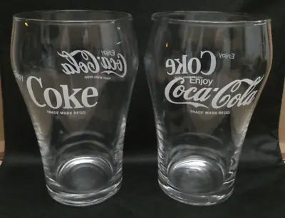 Two Coca Cola Clear Glasses With White Logo's • $36