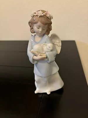 “Heavenly Love” (2001) Lladro Porcelain Figurine  • $140