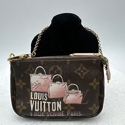 Authenticated Louis Vuitton Monogram Accessories Pochette 1 Rue Scribe Paris • $745