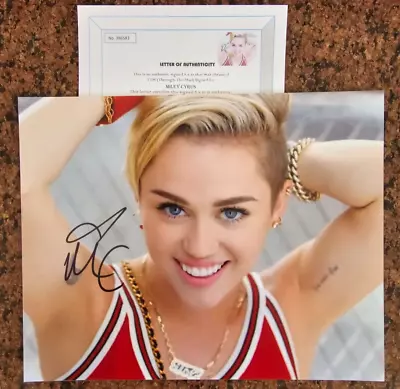 Signed Autograph Of Miley Cyrus • £8.44