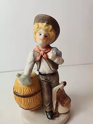 003 Little Cowboy Vintage Ceramic Bisque Figurine 5  Tall Saddle Barrel Flask • $3