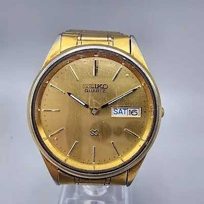 VTG Seiko SQ Watch Men 35mm Gold Dial Gold Tone Daydate Round 8123-8009 New Batt • $49.99