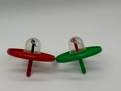 2 Vintage Plastic Spinning Flying Saucer UFO With Spaceman Toy • $29.99