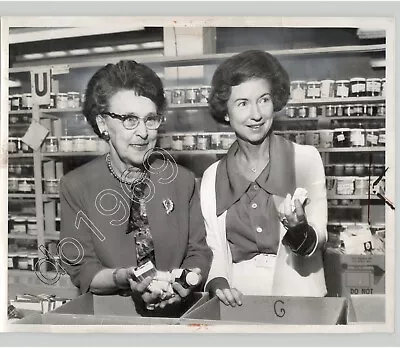 Mrs Auberlin & Mrs Romney Box Goods For WORLD MEDICAL RELIEF 1964 Press Photo • $45