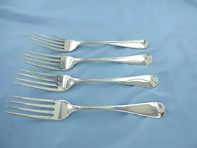 An Antique Set Of Four  Sterling Silver Old English Dinner Forks. London 1815. • £240