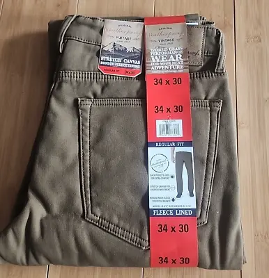 NWT WEATHERPROOF Men's Fleece Lined Performance Brown  Denim Jeans Size 34x30 • $24.99