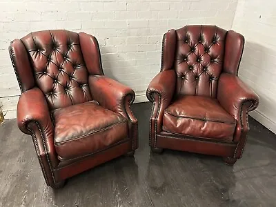 Chesterfield Tetrad Oskar Chairs A Pair Of Queen Ann Wing Chairs In Ox Blood Red • £1795