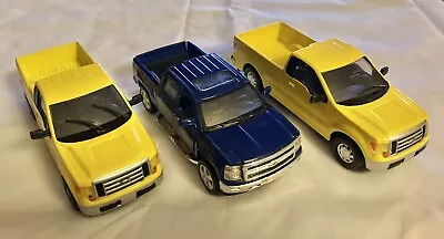 3 Piece Blue & Yellow Diecast  Ford F-150 Trucks 1/31 Scale • $14.99