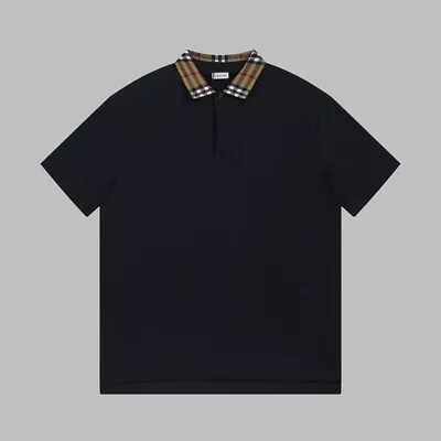 Burberry Polo Features A Striped Neckline And Side Warhorse • $155