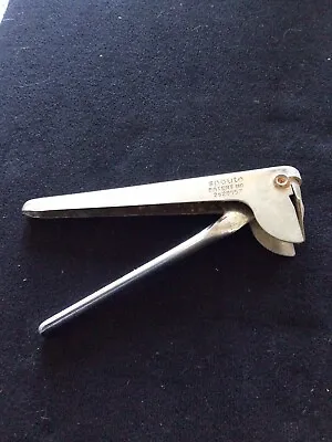 Vintage SPOUTO Oil Can Opener  • $10