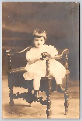 Antique Real Photograph Portrait Little Girl In White Dress Sitting In Chair • $4.49