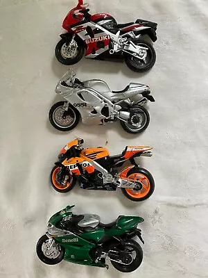 Lot Of 4 Diecast Motorcycles: Repsol Benelli 955iDaytona And Suzuki • $9.99