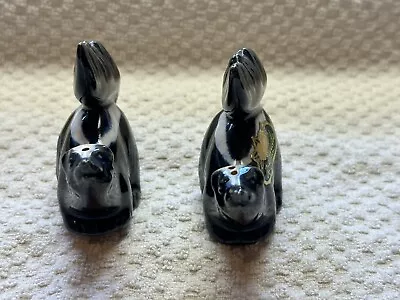 Set Of Rosemeade Skunk Salt And Pepper Shakers  • $50