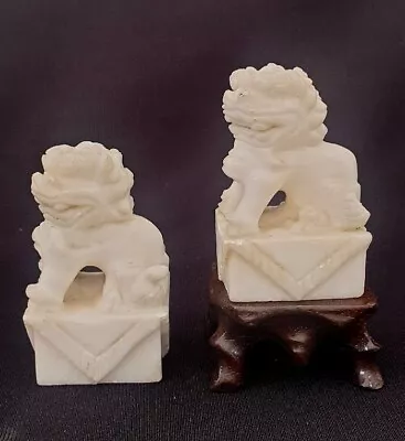 An Antique Chinese Pair Of Carved Stone Figures Modelled As Foo Dogs  • £34