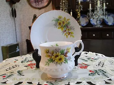 Vintage Royal Minster Fine Bone China Yellow Floral Tea Cup Saucer Set England • $12