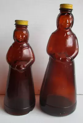 2 Vintage Mrs. Butterworth Bottles 10” & 8.25  Amber Glass Syrup * Kitchen Decor • $16.95