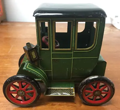 Vintage Modern Toys Lever Action Tin Car Works • $15.99