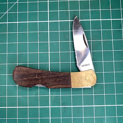 Vintage GERBER Lockback Knife-#97223 W/Wood Handles And Brass Bolsters • $25