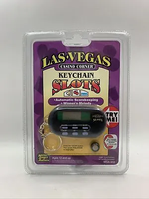 Las Vegas Casino Slots Micro Games America Handheld Electronic Keychain 1995 New • $8