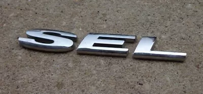 Ford Taurus SEL Emblem Letters Badge Decal Logo Trunk Chrome OEM Genuine Factory • $16.04