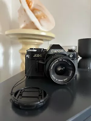 Canon AE-1 35mm SLR Film Camera With FD 28mm Lens Black • £110