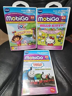 VTech MobiGo Game Lot Of 4 Dora Explore HELLO KITTY Thomas Disney PLANES • $29.99