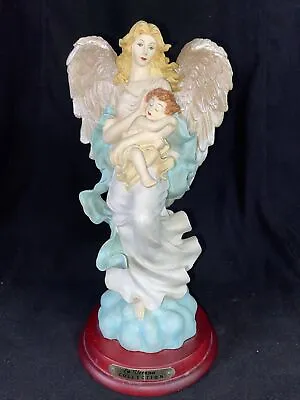 La Verona Collection 10” Angle Figurine Holding Sleeping Child Pink Blue Yellow • $7.50