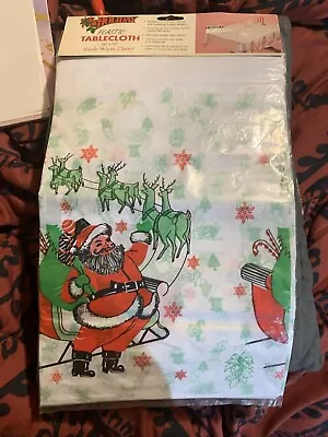 Vintage Santa Claus And Reindeer Plastic Tablecloth • $16.95