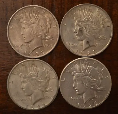 4X 1922-1935 U.S Silver Peace Dollars Average Circulation • $139.99