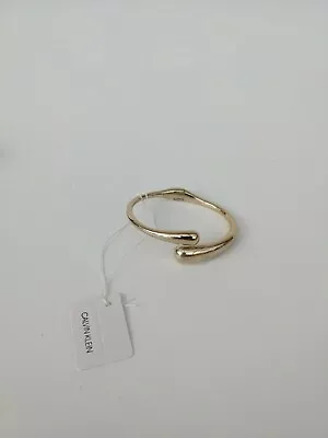 CALVIN KLEIN Ellipse Gold Tone Open Bangle Bracelet - SIZE XS • £59.99