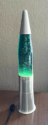 Vtg Pliable Art Glitter Motion Lamp Silver Bullet Green Iridescent Glitter 19  • $39.99