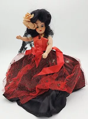 Beautiful Vintage Doll Black Hair Blue Eyes Red Dress 7  • $10