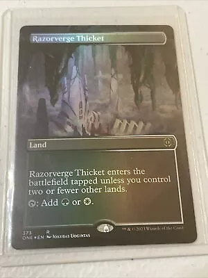 MTG FOIL Razorverge Thicket Borderless 373 Phyrexia: All Will Be One • $4.55