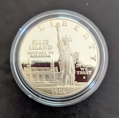 1986 Ellis Island Silver Dollar In Capsule  • $30