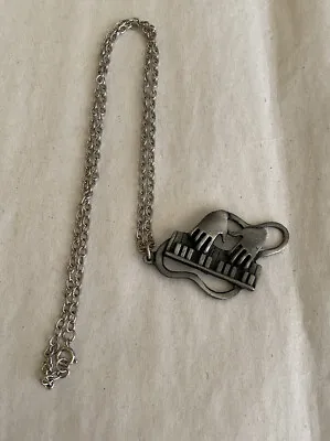Hands Playing The Piano  Necklace • $11
