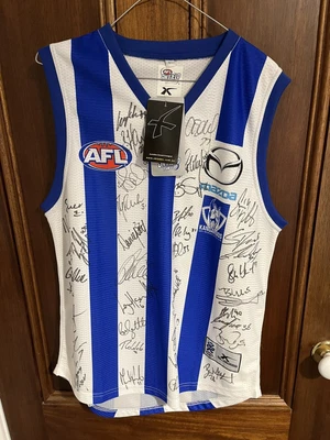 $150 • Buy Signed North Melbourne Kangaroos AFL 2011 Home Guernsey Jumper X Blades Football