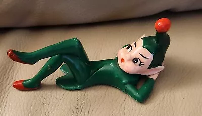 Vintage Green Christmas Elf Pixie Rubber Laying Down Relaxing Figurine  • $15.99