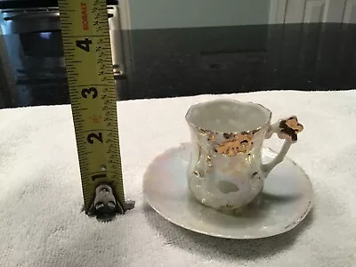 Gold And Cream Colored Miniature Teacup And Saucer Set • $12