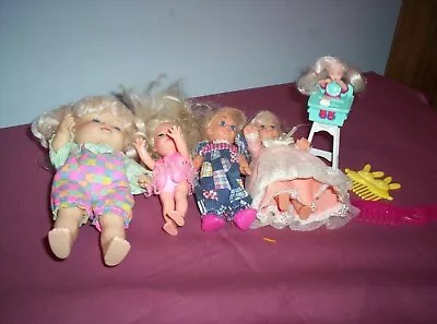 Set Of 4 Dolls And 1998 Barbie Mini Highchair • $15